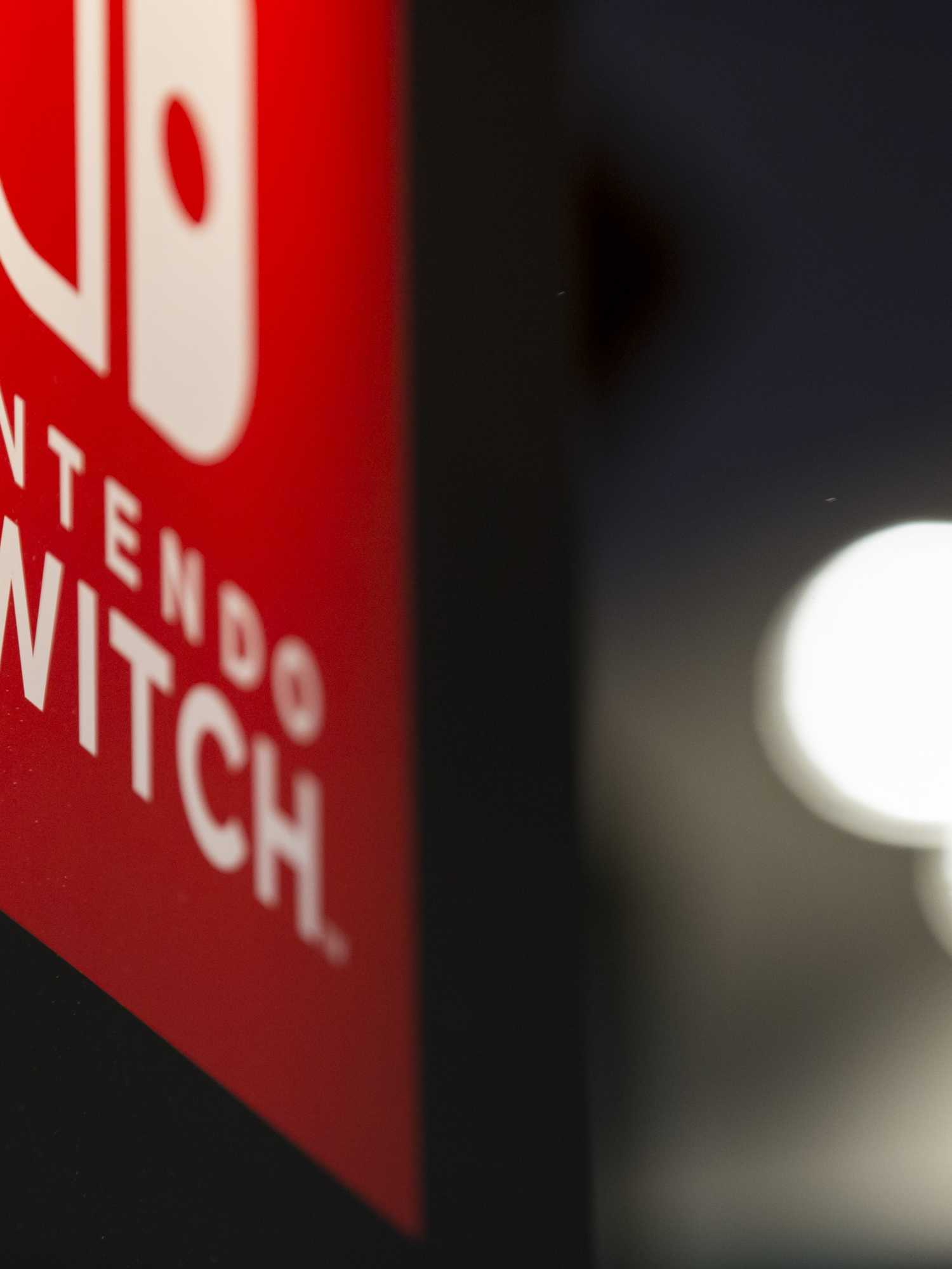 The logo of Nintendo Co.'s Switch video game console is displayed in the Capcom Co. booth during the Tokyo Game Show 2017 at Makuhari Messe on September 21, 2017 in Chiba, Japan