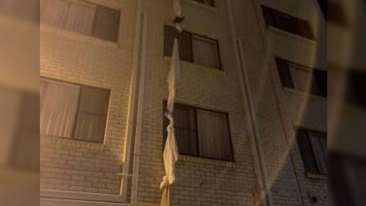 <p>The man managed to flee from a fourth-floor window thanks to his makeshift rope</p>