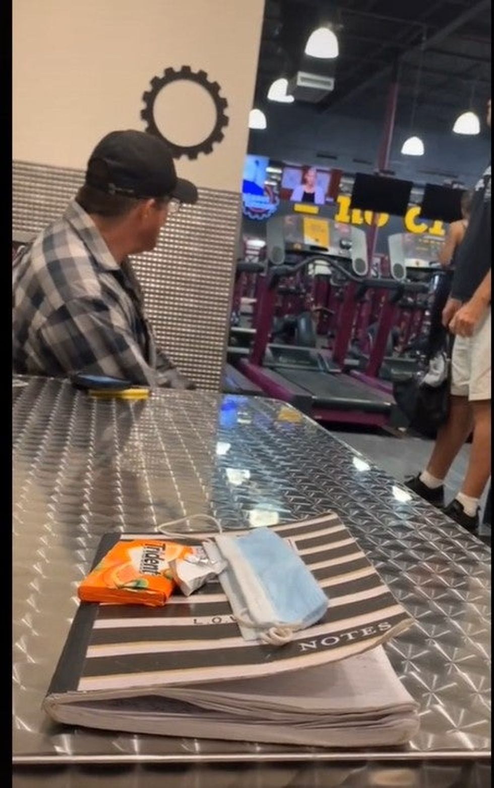 <p>The men were apparently making comments about a woman on a treadmill</p>