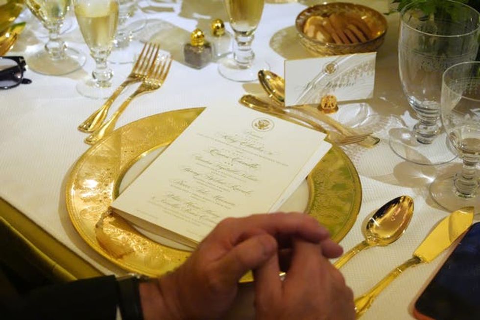 The menu for the State Dinner during the King and Queen's visit to the US (AP Photo/Alex Brandon)