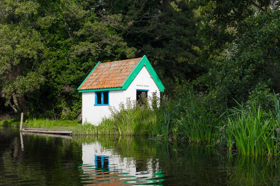 The Peter Pan-inspired Wendy's House at Thorpeness Meare in Suffolk. (Historic England Archive/ PA)