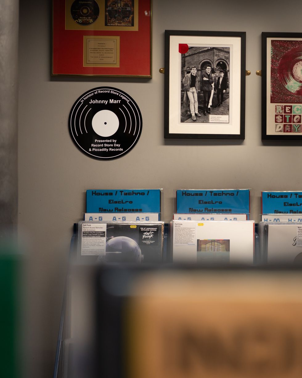 The plaque on the wall of the store