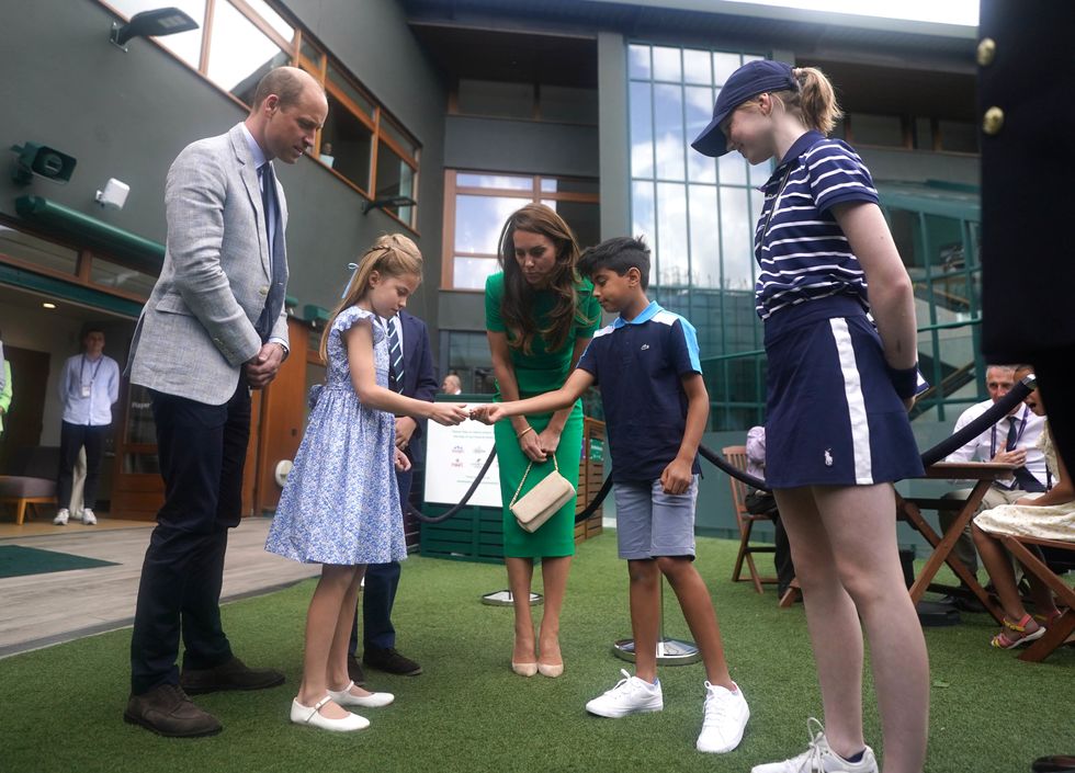 Prince George and Princess Charlotte meet boy who tossed coin for Wimbledon final