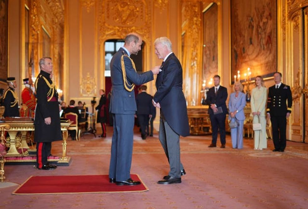 The Prince of Wales honours Mr Moyes at Windsor Castle