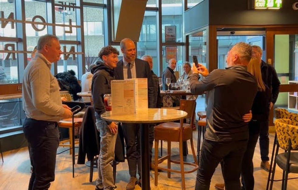 The Prince of Wales meeting Aston Villa supporters in a Wetherspoons pub in the centre of Birmingham