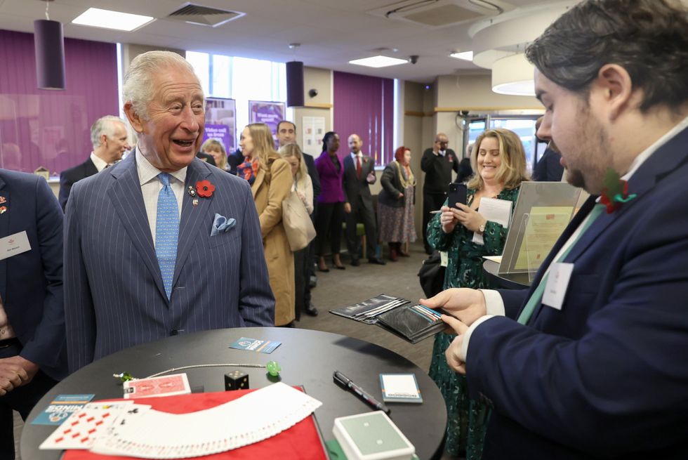 The Prince of Wales meets magician Chris Wall during a visit to meet Prince\u2019s Trust Young Entrepreneurs (Chris Jackson/PA)