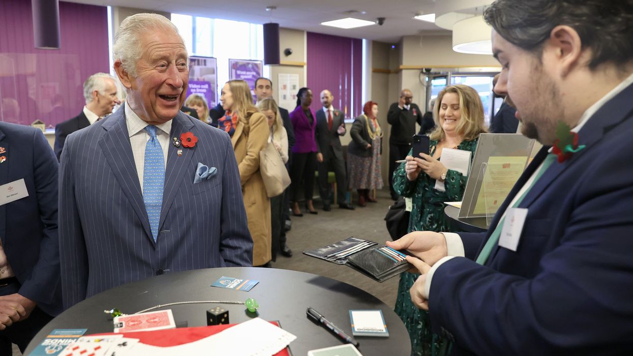 The Prince of Wales meets magician Chris Wall during a visit to meet Prince’s Trust Young Entrepreneurs (Chris Jackson/PA)