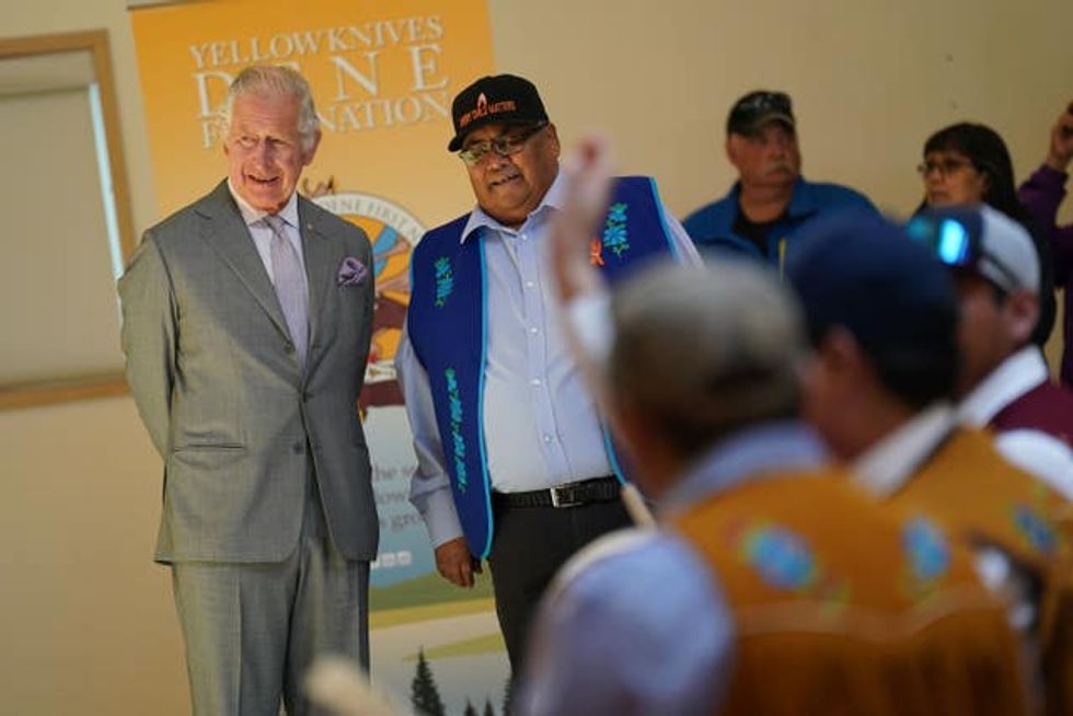The Prince of Wales watches a display following a roundtable with Yellowknives Dene First Nation Leadership in Yellowknife