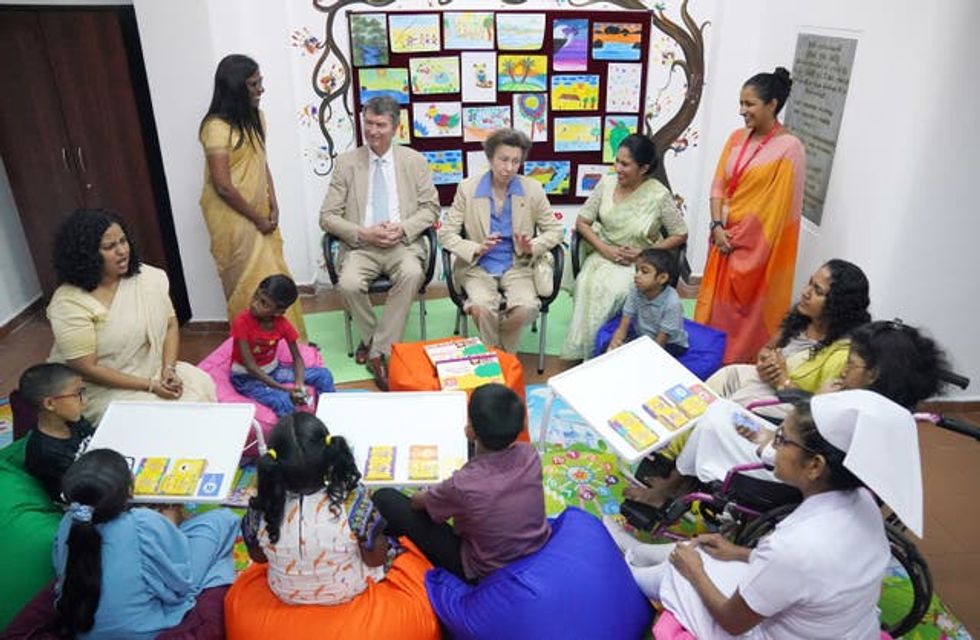 The Princess Royal and her husband Vice Admiral Sir Timothy Laurence engage with a group of children and staff using a social-emotional learning toolkit for children during a visit to Lady Ridgeway Hospital for Children in Colombo during day one of their visit to mark 75 years of diplomatic relations between the UK and Sri Lanka