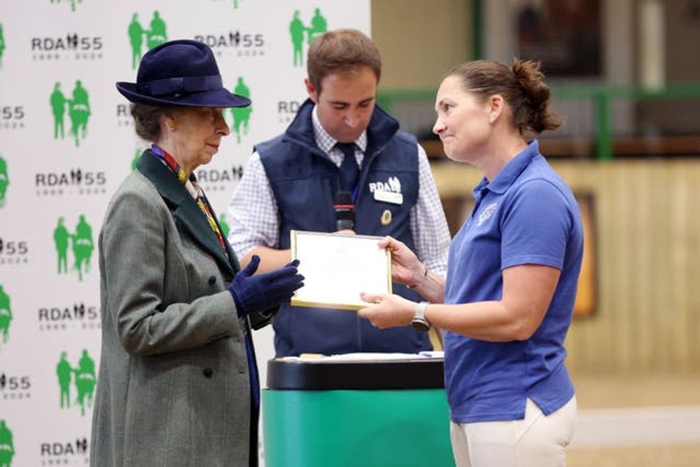 The Princess Royal presents an award during the Riding for the Disabled Association National Championships (Cameron Smith/PA)