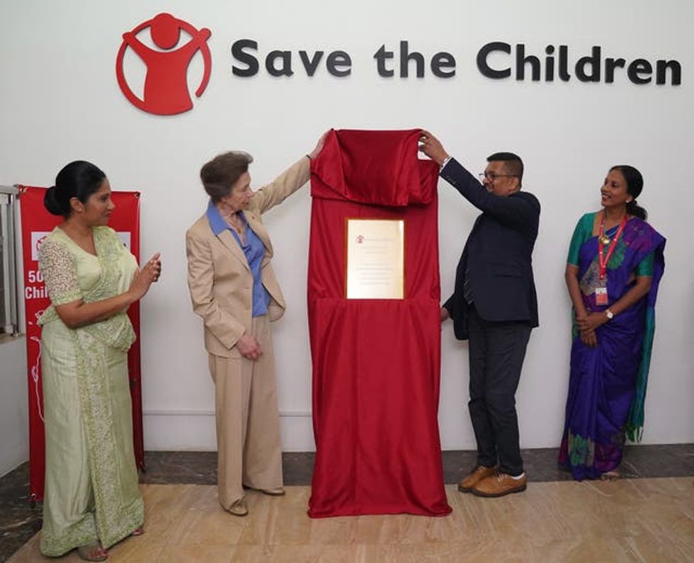 The Princess Royal unveils a plaque during a visit to Save the Children HQ in Colombo during day one of their visit to mark 75 years of diplomatic relations between the UK and Sri Lanka