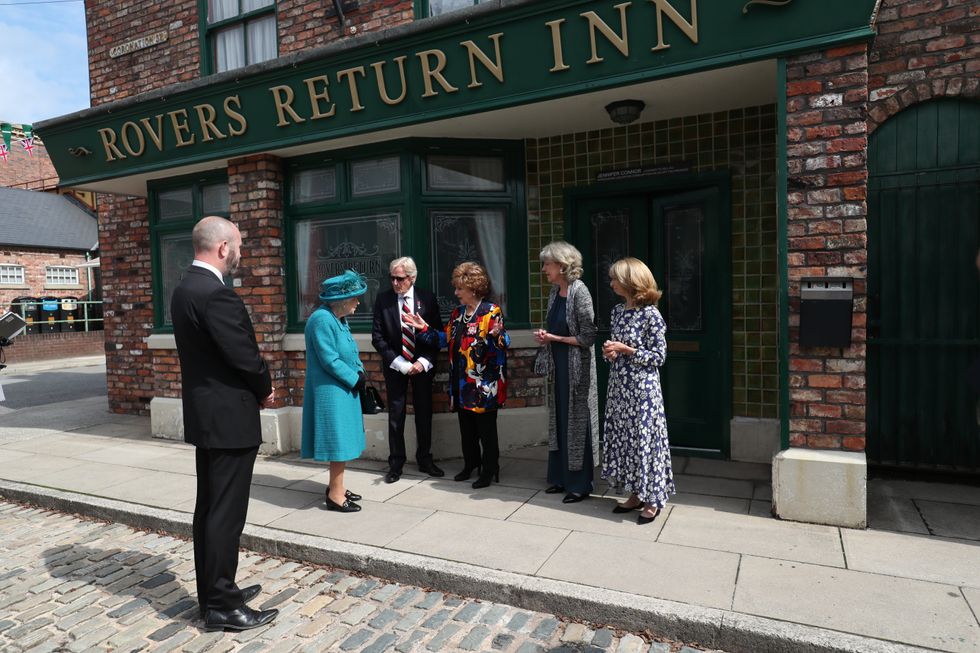 The Queen meets actors (left to right) William Roache, Barbara Knox, Sue Nicholls and Helen Worth, outside the Rovers Return (Scott Heppell/PA)
