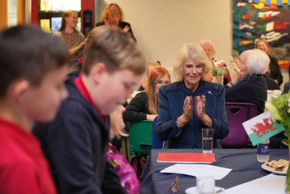 The Queen meets pupils during a visit to Cyfarthfa Primary School in Merthyr Tydfil in South Wales