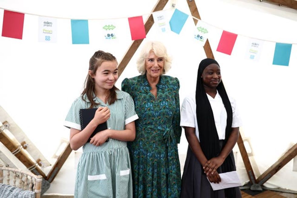 The Queen poses for a picture with London\u2019s newly appointed Young Poet Laureates