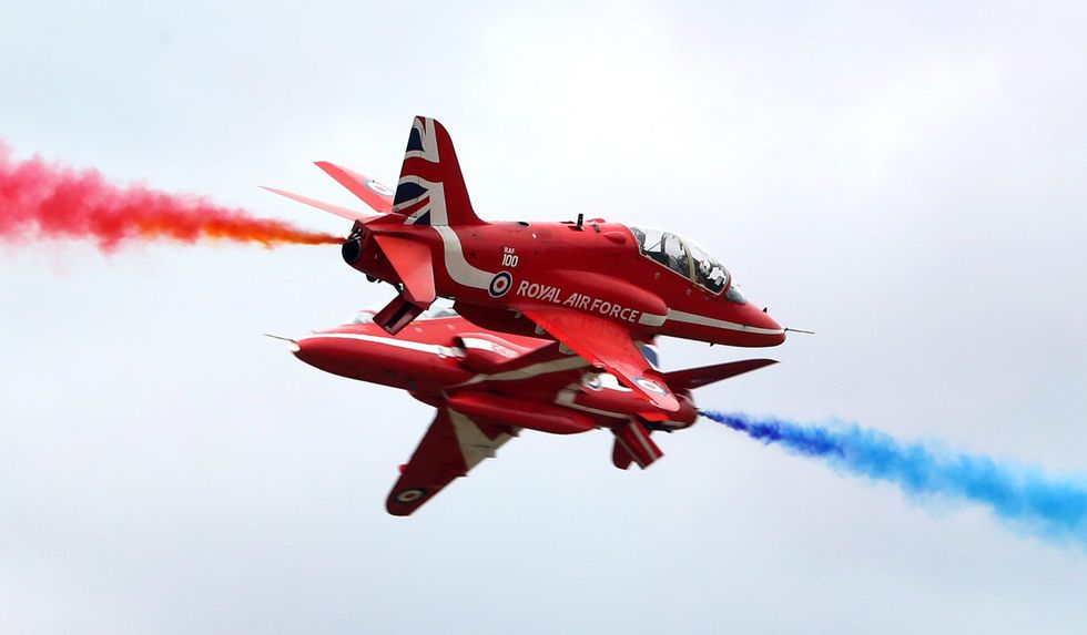 The RAF Red Arrows perform at the Biggin Hill Festival of Flight (PA)