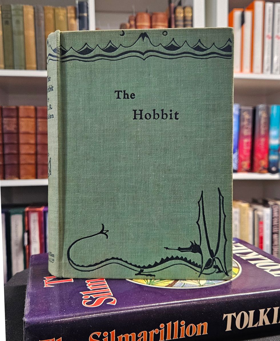 The rare Hobbit edition stands on a pile of books