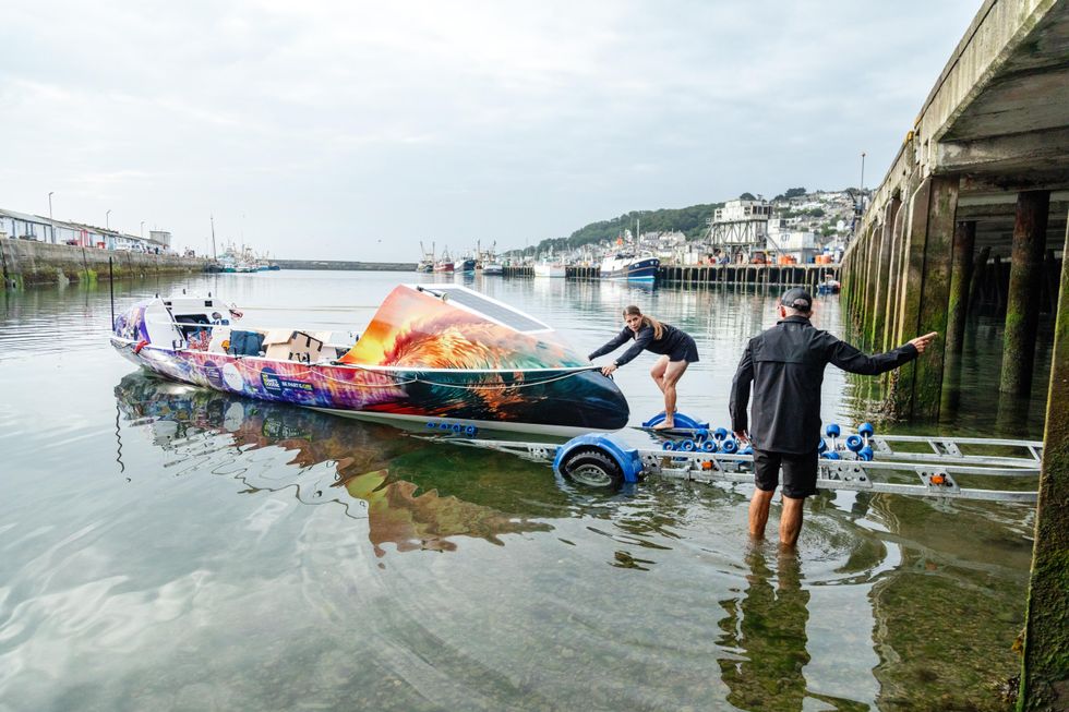The ROW4MND crew prepare to set off from Newlyn harbour in Cornwall (Mike Newman/ROW4MND/PA)