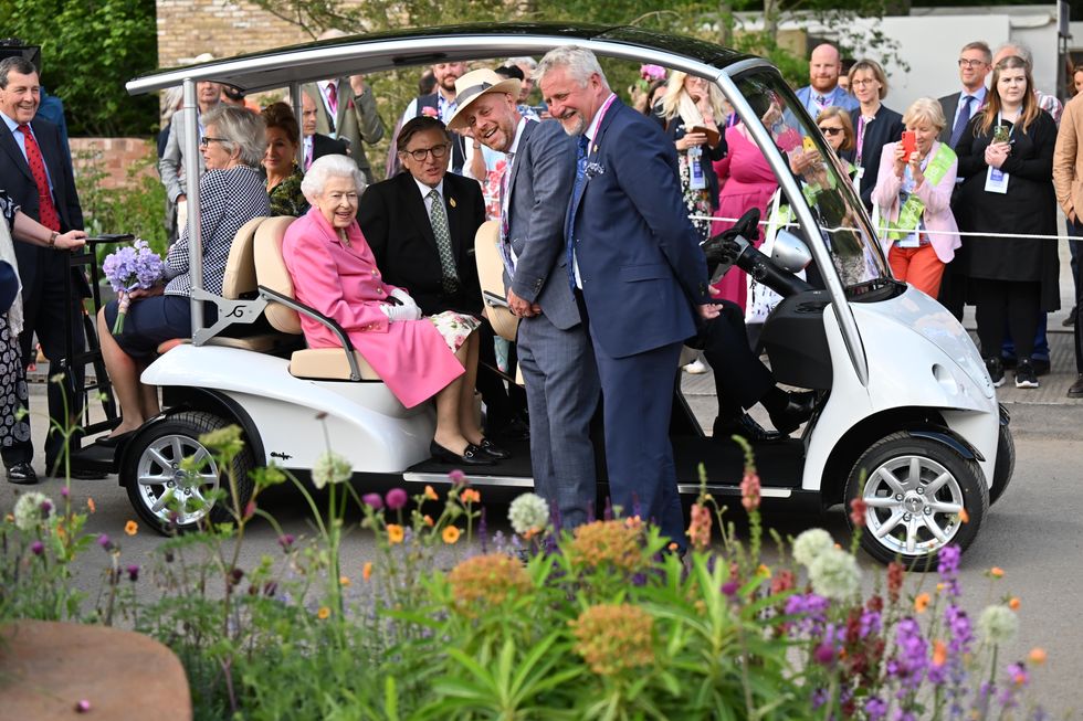 Queen tours Chelsea Flower Show from comfort of electric buggy