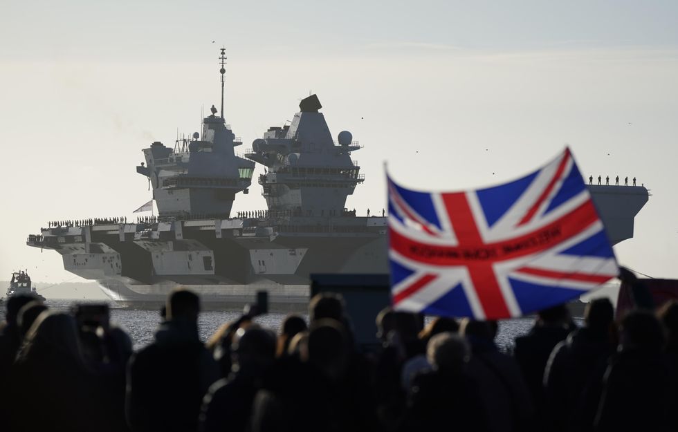 Families and friends welcome aircraft carrier HMS Prince of Wales home