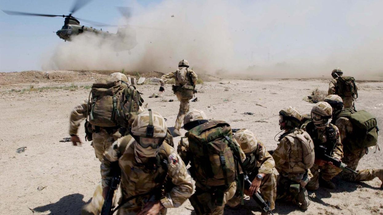 The Royal Welch Fusiliers mount helicopter borne Eagle VCP's on 2 July 2004 Basra