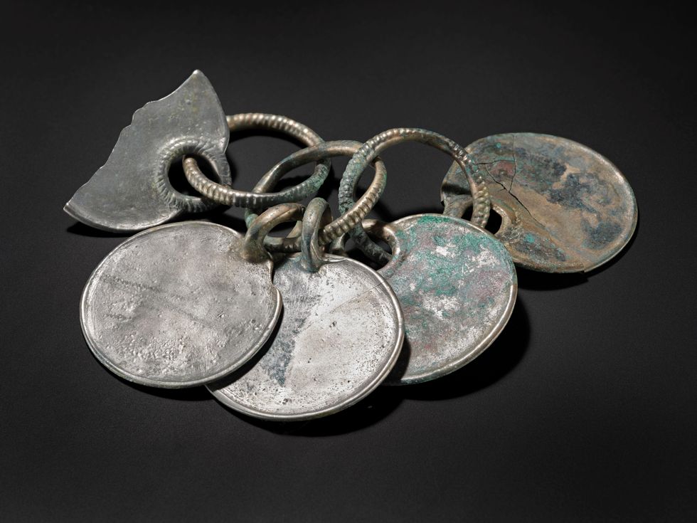 Museum staff describe ‘magical’ moment hoard’s silver colour was revealed