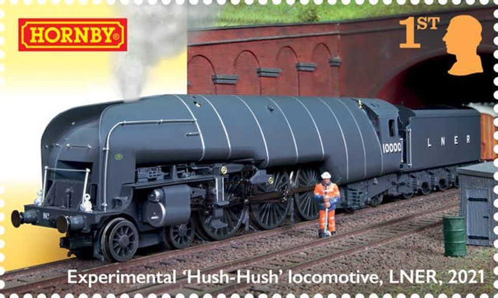 The stamps show photos of model trains