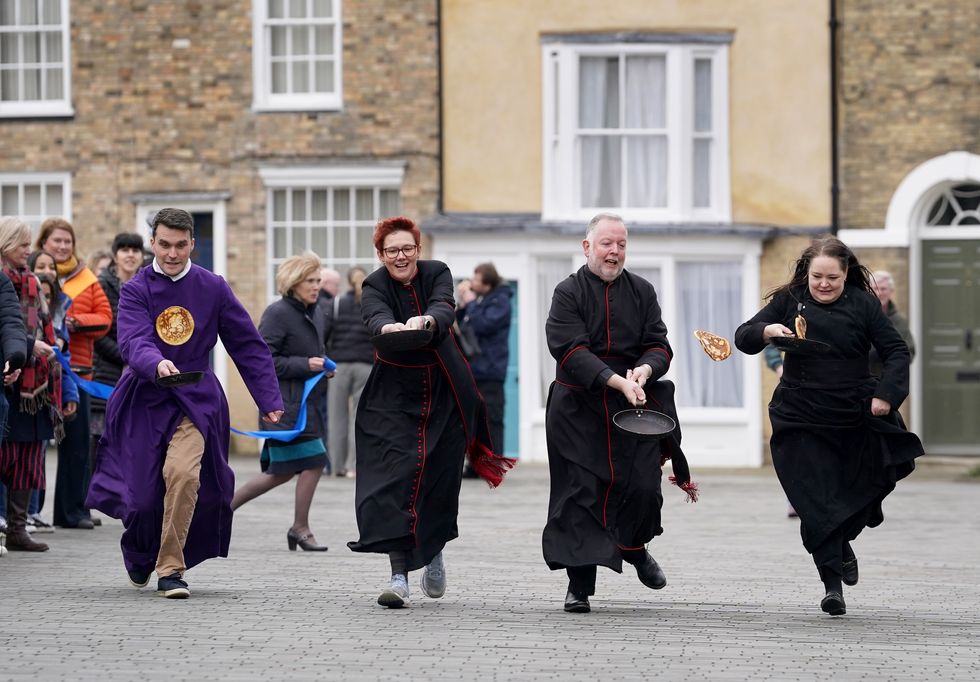 Canterbury Cathedral hosts first pancake race in decades for Shrove Tuesday