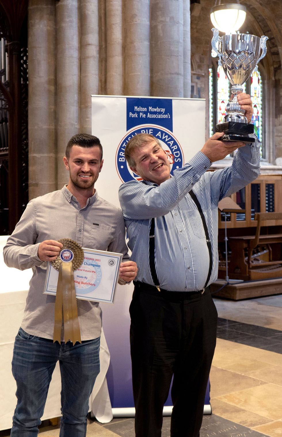 The winner of the Supreme Champion of the 2021 British Pie Awards, Robert Bowring and his son George (Martin Elliott/British Pie Awards/PA)