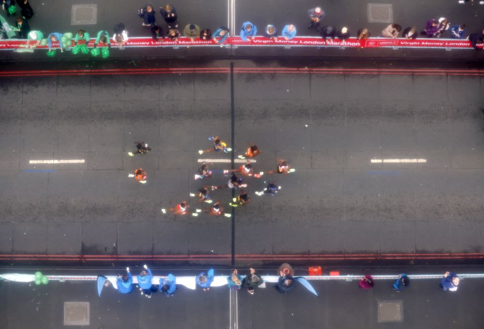 The women\u2019s elite race passes over Tower Bridge (Steven Paston/PA)