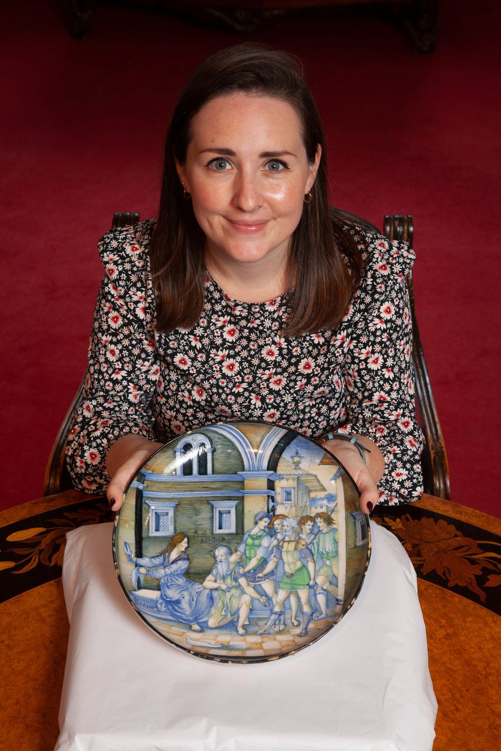 Theodora Burrell, antiques specialist at Lyon & Turnbull with the 16th century Italian dish that sold for more than \u00a31m (picture: Gary Doak Photography)