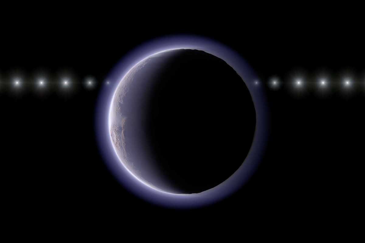 Surprise atmosphere on tiny icy world challenges astronomical theories