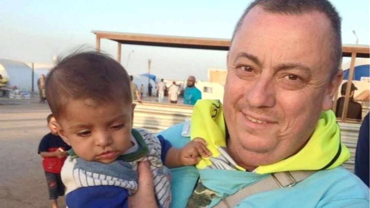 This photo of Alan Henning, at a refugee camp on the Turkey-Syria border, was released by his family
