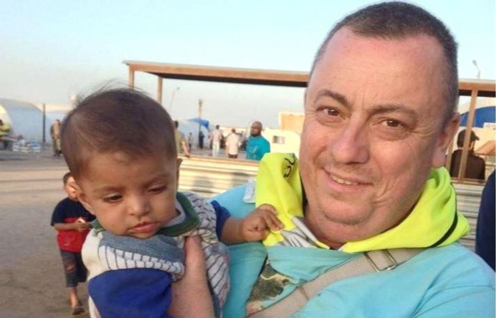 This photo of Alan Henning, at a refugee camp on the Turkey-Syria border, was released by his family