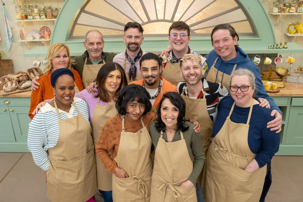This year's Bake Off contestants in the kitchen with their aprons on