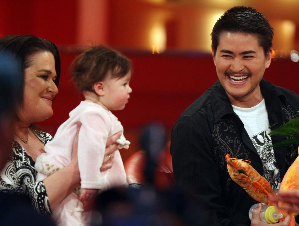 Thomas Beatie with his daughter Susan Juliette pictured during a German TV show.