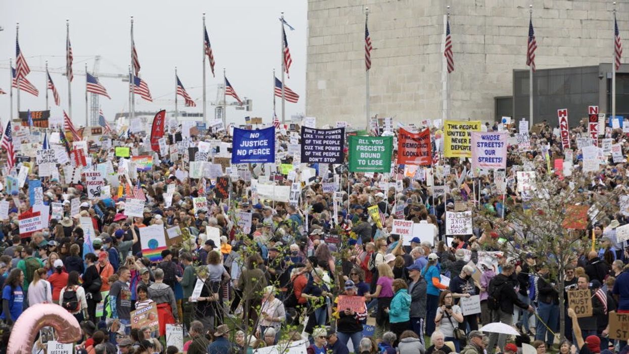 6 of the best 'Hands Off' protest signs as millions call out Donald Trump's administration
