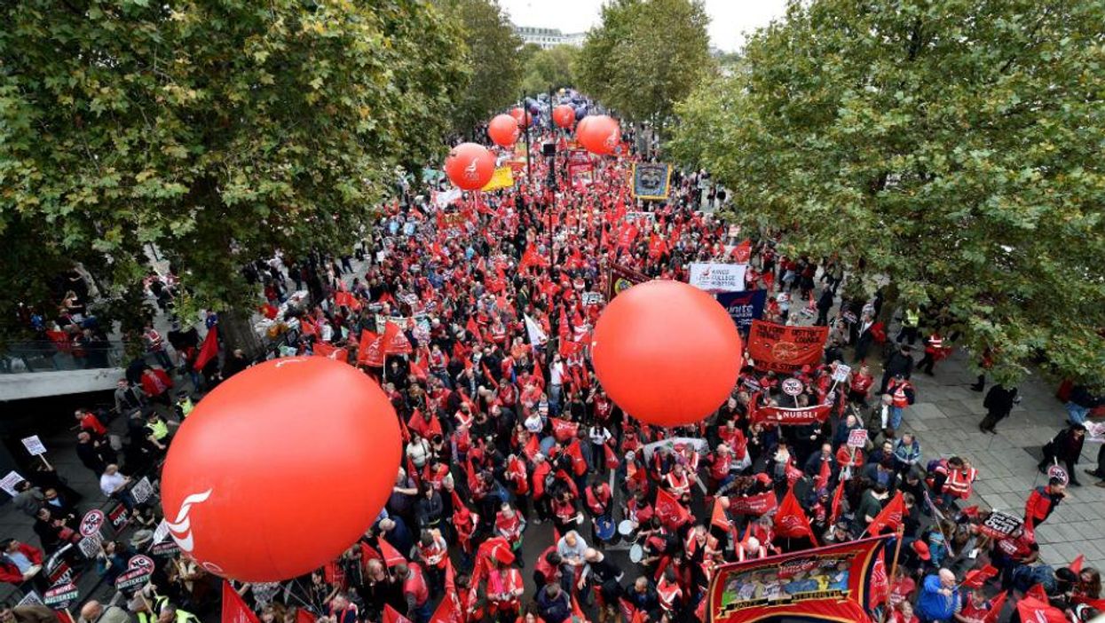 Thousands of people march in London against falling real wages