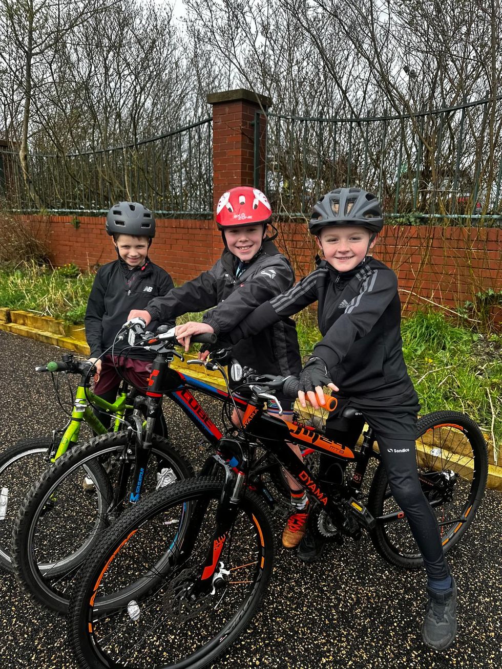 Three boys on bikes