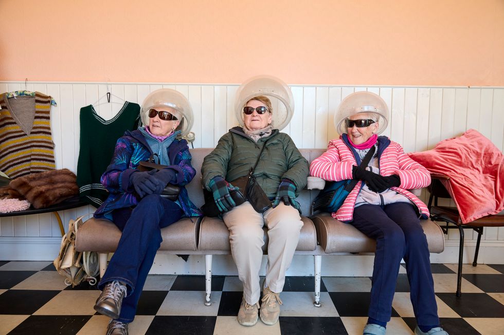 Three visitors to Beamish Museum wearing immersive experience glasses