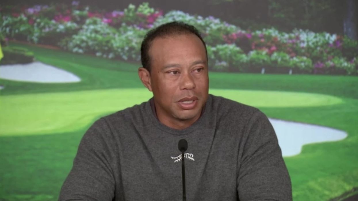 Tiger Woods shaking hands with a tree has become an instant meme