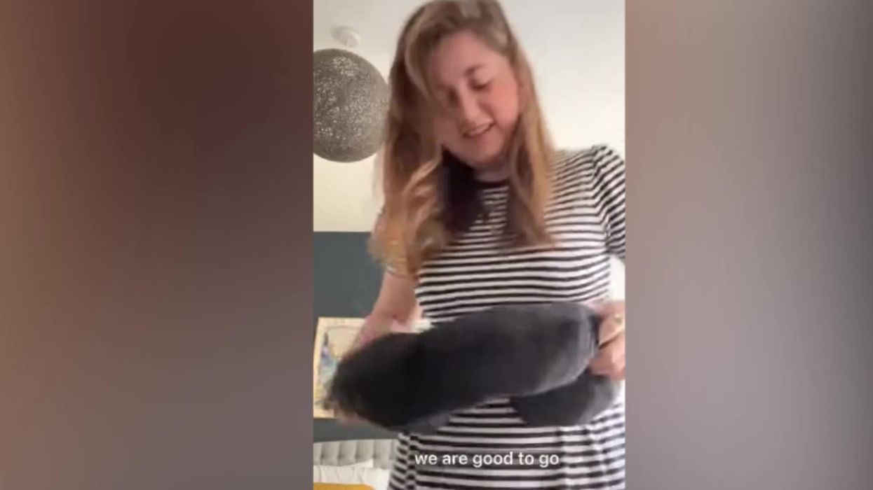 Woman winds up wearing bonkers outfits just to avoid airport baggage fee