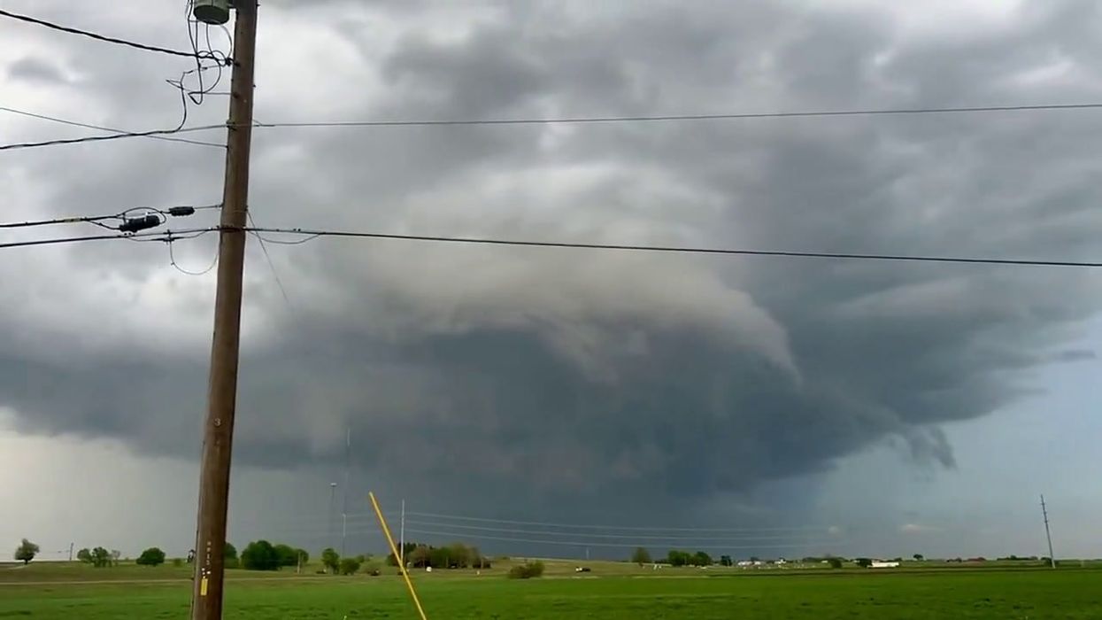 Man captures footage of 'ghostly figures walking out of clouds' following tornado
