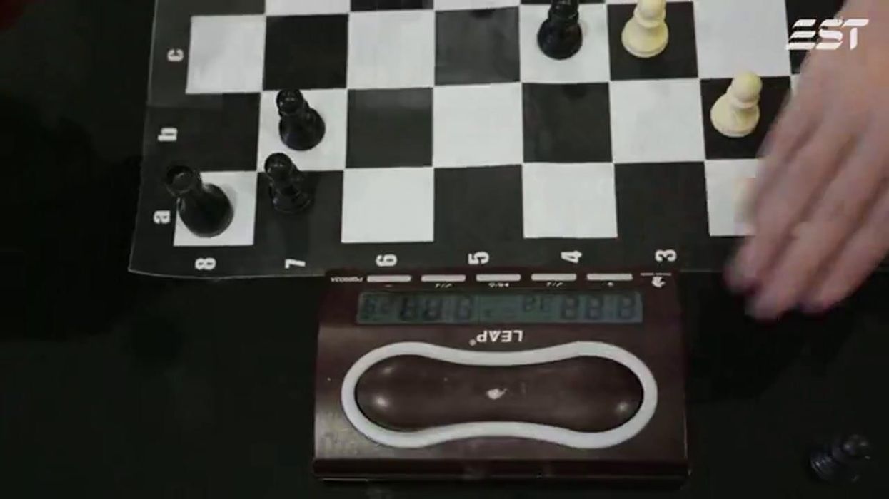 Chess champion stripped of title after doing a poo in a hotel bathtub