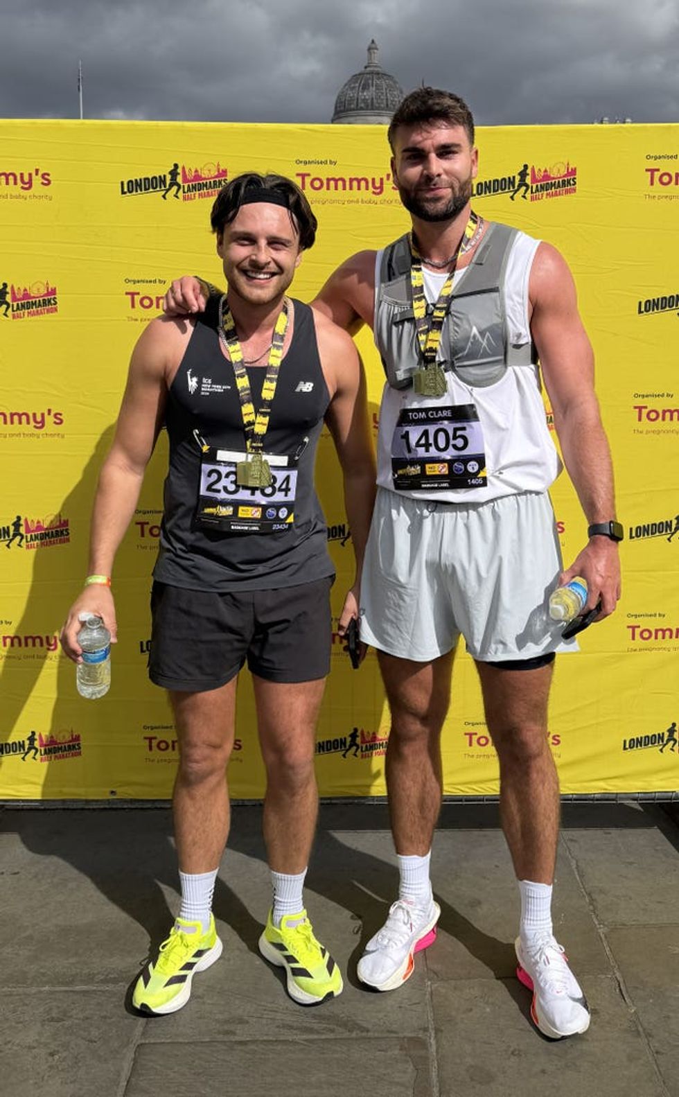 Tom Claire and Casey O\u2019Gorman smiling while in running gear