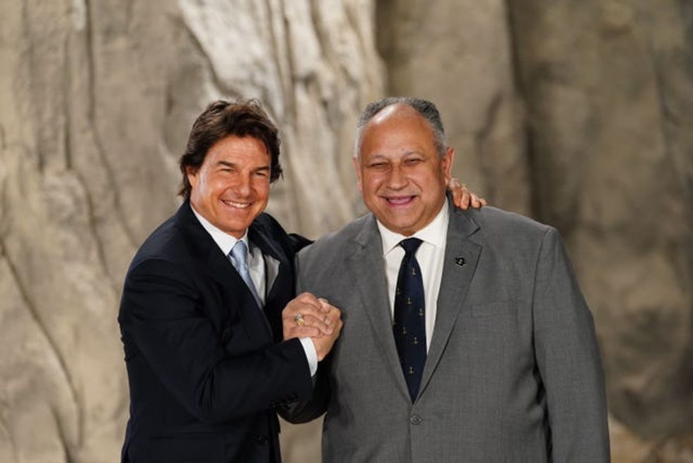Tom Cruise with US navy secretary Carlos Del Toro