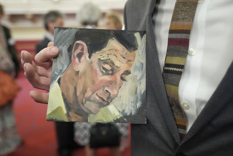 Tom Hallifax with one of his works