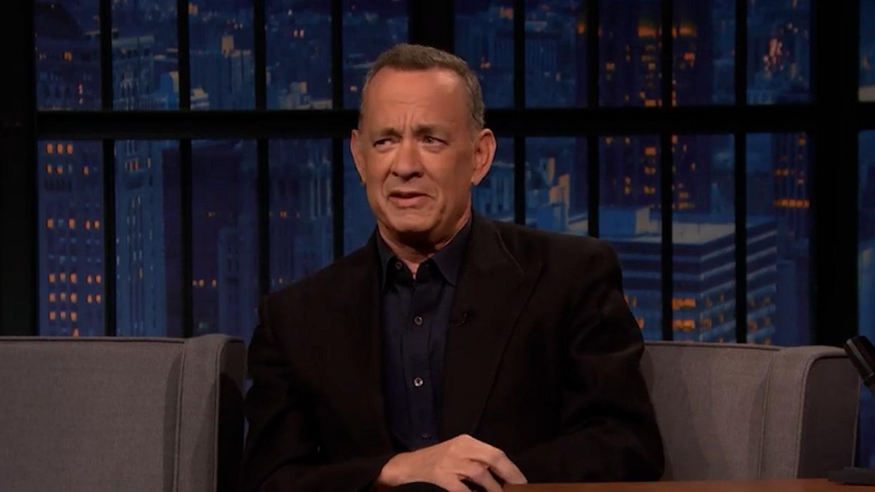 Tom Hanks jokes about why he loves crashing weddings