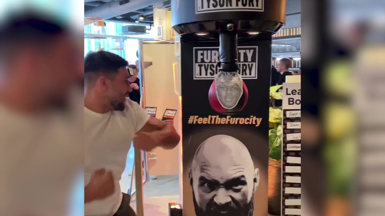 Tommy Fury practices 'knocking out' KSI on punch machine of YouTuber's face
