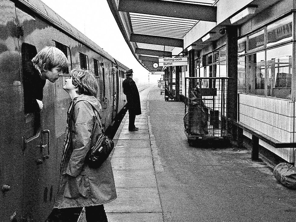 Tony Wilmot was snapped saying goodbye to his girlfriend Sally at Peterborough Railway Station in 1980 and a year later they got married
