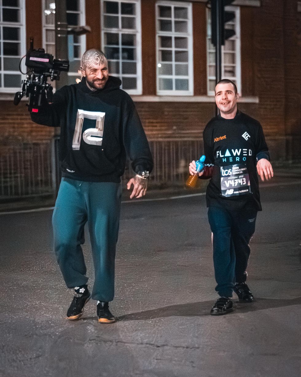 Tow men standing together